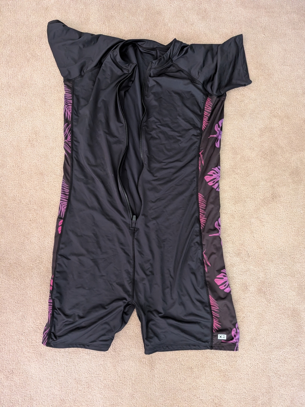 TomboyX Black One-Piece Swimsuit with Purple Floral Side Panels